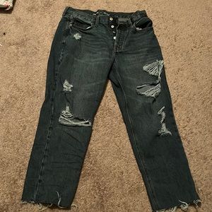 Slouchy straight fit women’s blue ripped jeans